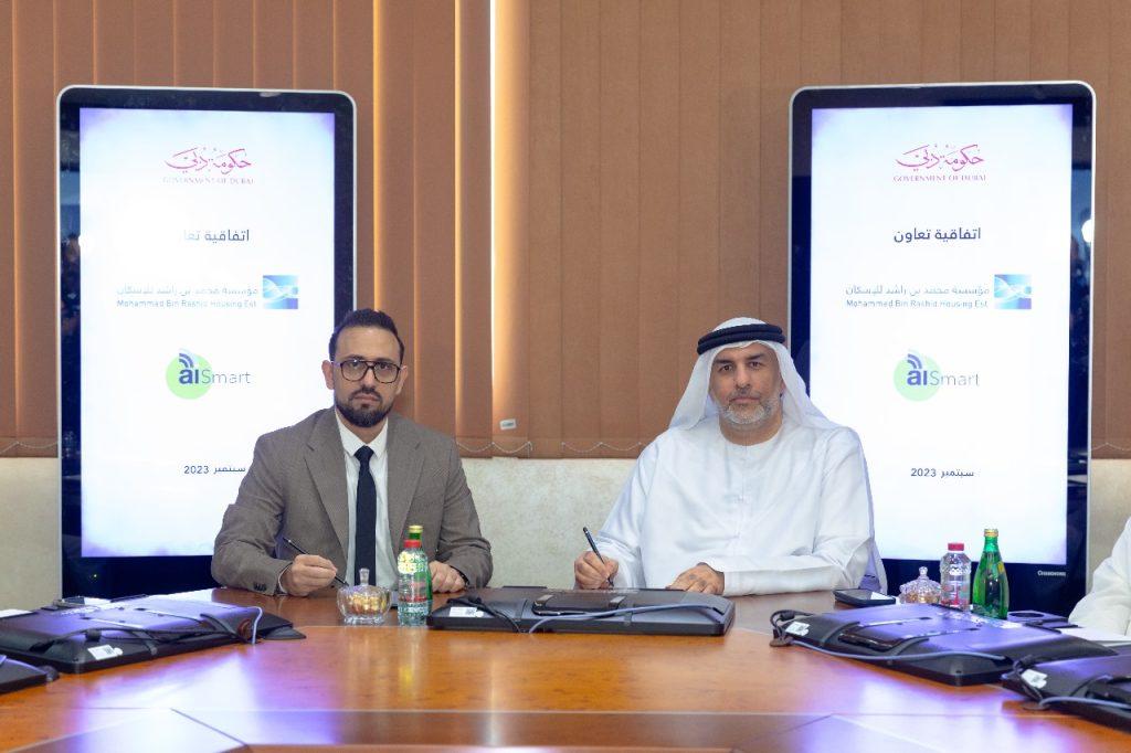 Mohammed Al Shehhi and Hussein Ahmed during the signing of the Memorandum of Understanding.