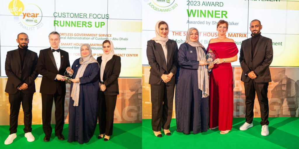 Mariam Al Suwaidi receiving the award from a representative of the IdeasUK Organization.