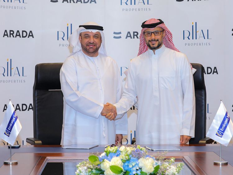 Abdulla Qassem, Chairman of Rital Properties (left) and Prince Khaled bin Alwaleed bin Talal, Vice Chairman of Arada sign the agreement at the EmiratesNBD headquarters in Dubai Source: Gulfnews.com