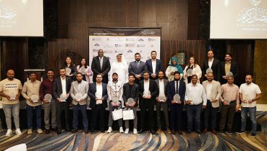 Top officials with awards winners during a ceremony in Dubai.