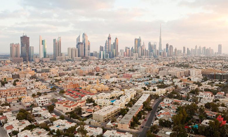 Elevated view of the new Dubai skyline including the Burj Khalifa on Sheikh Zayed Road, Dubai