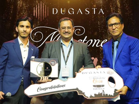 Piyush Shah receives the award for being the Top Sales Achieving Relationship Manager at the Dugasta Properties Milestone Gala from Chairman Tauseef Khan (Right) and Azaan Khan, CEO Image Credit: Supplied