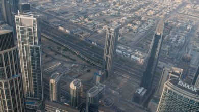 An aerial view shows skyscrapers and Dubai city from the top of Burj Khalifa. (Photo: Getty Images)