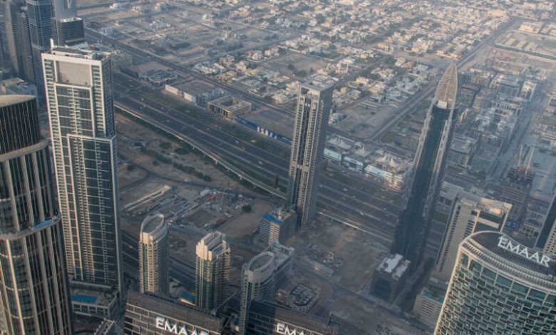 An aerial view shows skyscrapers and Dubai city from the top of Burj Khalifa. (Photo: Getty Images)