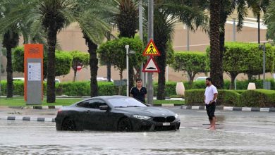 A car is stranded on a flooded street in Dubai on May 2 as heavy rains returned two weeks after record downpours. AFP